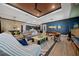 Open living space features a pool table, stylish decor, and seamless flow to the kitchen at 8825 Sw 57Th Place Rd, Ocala, FL 34481
