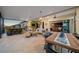 Inviting outdoor living area with dining and seating areas perfect for enjoying the outdoors at 8825 Sw 57Th Place Rd, Ocala, FL 34481