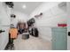 Spacious walk-in closet with ample storage and organization, includes shelving and a center ottoman at 8825 Sw 57Th Place Rd, Ocala, FL 34481