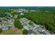 Aerial view of a well-maintained neighborhood showcases mature landscaping and lovely single-Gathering homes at 8832 Sw 108Th St, Ocala, FL 34481