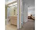 Bathroom featuring a tile shower and tub combination, modern lighting, and neutral walls at 8832 Sw 108Th St, Ocala, FL 34481