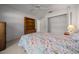 Bright bedroom with closet, vintage dresser, and doorway entrance view at 8832 Sw 108Th St, Ocala, FL 34481