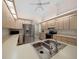 Spacious kitchen featuring stainless steel appliances, light wood cabinets, and a double sink at 8832 Sw 108Th St, Ocala, FL 34481