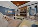 Stylish living room features a modern fireplace, TV, comfortable seating, and attractive decor at 8825 Sw 57Th Place Rd, Ocala, FL 34481