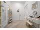 Charming room featuring modern shelving, a vanity area, and natural light creating a serene ambiance at 8825 Sw 57Th Place Rd, Ocala, FL 34481
