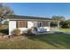 Charming home with a well-manicured lawn and stylish shutters, offering great curb appeal at 10495 Sw 100Th Ave, Ocala, FL 34481