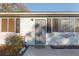 Welcoming front entrance with stylish shutters and decorative accents, adding character to the home at 10495 Sw 100Th Ave, Ocala, FL 34481