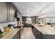 Well-equipped kitchen with stainless steel appliances and open layout to living area at 1300 Ne 53Rd St, Ocala, FL 34479