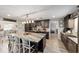 Well-designed kitchen with a large island, stainless steel appliances, and stylish pendant lighting at 1300 Ne 53Rd St, Ocala, FL 34479