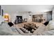 Large living room with open floor plan to the kitchen at 1300 Ne 53Rd St, Ocala, FL 34479