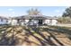 Backyard with patio and chairs at 13458 Sw 113Th Pl, Dunnellon, FL 34432