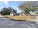 View of the house, corner lot, with street sign at 13458 Sw 113Th Pl, Dunnellon, FL 34432