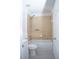Well-lit bathroom features a shower-tub combo with tiled walls at 13700 Sw 48Th Ct, Ocala, FL 34473