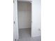 Walk-in closet providing ample storage space for an organized wardrobe at 13700 Sw 48Th Ct, Ocala, FL 34473