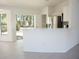 Kitchen counter looking over into the living area with stainless steel appliances at 13700 Sw 48Th Ct, Ocala, FL 34473
