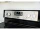 Close up of a modern Whirlpool oven with a digital display and knob controls at 13700 Sw 48Th Ct, Ocala, FL 34473
