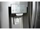 Close-up of a stainless steel refrigerator featuring ice and water dispenser at 13700 Sw 48Th Ct, Ocala, FL 34473
