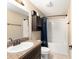 Neutral bathroom featuring granite vanity, ceramic tile flooring and white shower-tub combo at 159 Water Trak, Ocala, FL 34472