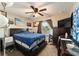 Main bedroom boasts a fan, closet and neutral color palette at 159 Water Trak, Ocala, FL 34472