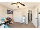 Bedroom features a large closet, carpet flooring, and ceiling fan at 159 Water Trak, Ocala, FL 34472