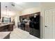 Modern kitchen with stainless steel appliances, granite countertops, and a spacious layout at 159 Water Trak, Ocala, FL 34472