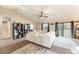 Bright living room with neutral color palette, vaulted ceilings, and sliding door to the outside at 159 Water Trak, Ocala, FL 34472