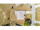Aerial view of the home showcasing the backyard, shed and neighboring properties at 17 Pine Course Loop, Ocala, FL 34472