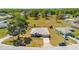 Aerial view of the home showcasing the spacious lot and surrounding mature trees at 17 Pine Course Loop, Ocala, FL 34472