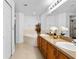 Bathroom boasts a large vanity with double sinks and a relaxing soaking tub at 17 Pine Course Loop, Ocala, FL 34472
