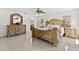 Main bedroom features a ceiling fan, full length mirror, and stylish design at 17 Pine Course Loop, Ocala, FL 34472