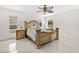 Main bedroom features a ceiling fan, windows and stylish design at 17 Pine Course Loop, Ocala, FL 34472