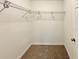 A walk-in closet with wire shelving offers plenty of storage space at 17710 Sw 48Th Pl, Dunnellon, FL 34432