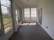 Enjoy the lanai with neutral flooring, multiple windows, and access to the backyard at 2459 Nw 55Th Avenue Rd, Ocala, FL 34482