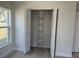 Bedroom closet with built-in shelving, providing ample storage space and organization at 31 Juniper Pass Ln, Ocala, FL 34480