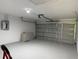 Spacious garage featuring ample room for storage and parking at 31 Juniper Pass Ln, Ocala, FL 34480