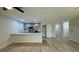 Bright, modern kitchen with a bar, stainless steel appliances, and open layout at 31 Juniper Pass Ln, Ocala, FL 34480