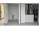 Utility room with laundry hookups, open storage area and mechanical equipment at 31 Juniper Pass Ln, Ocala, FL 34480