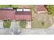 Aerial view of the property showcasing the layout, landscaping, and the surrounding neighborhood at 3447 Sw 19Th Pl, Ocala, FL 34474