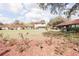 Sprawling green community lawn features mature landscaping around well-maintained homes with red tile roofs at 3447 Sw 19Th Pl, Ocala, FL 34474
