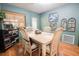 Cozy dining area with wood floors, table, and decor at 3447 Sw 19Th Pl, Ocala, FL 34474