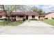 Charming single-story home with a well-maintained lawn and a spacious driveway at 3447 Sw 19Th Pl, Ocala, FL 34474