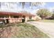 Charming single-story home with a well-manicured front yard and a spacious driveway at 3447 Sw 19Th Pl, Ocala, FL 34474