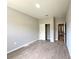 Neutral toned bedroom with a closet and light toned tile floors at 4059 Sw 131St Place Rd, Ocala, FL 34473