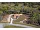 Aerial view of house with large yard, showcasing its desirable location and ample outdoor space at 4869 Nw 101St Street Rd, Ocala, FL 34482