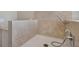 Tiled walk-in shower with adjustable shower head and sleek fixtures at 4869 Nw 101St Street Rd, Ocala, FL 34482