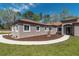 Charming one-story home with landscaped yard and modern curb appeal at 4869 Nw 101St Street Rd, Ocala, FL 34482