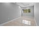 Bright open living room with decorative floors and high ceilings at 4869 Nw 101St Street Rd, Ocala, FL 34482