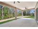 Covered patio with ceiling fans and spacious outdoor area at 4869 Nw 101St Street Rd, Ocala, FL 34482