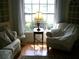 Well lit seating area with window view and wood floors at 5181 Sw 164Th Street Rd, Ocala, FL 34473