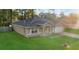 Lovely single-story home featuring a well-kept lawn and a convenient attached two-car garage at 5758 Nw 63Rd Pl, Ocala, FL 34482
